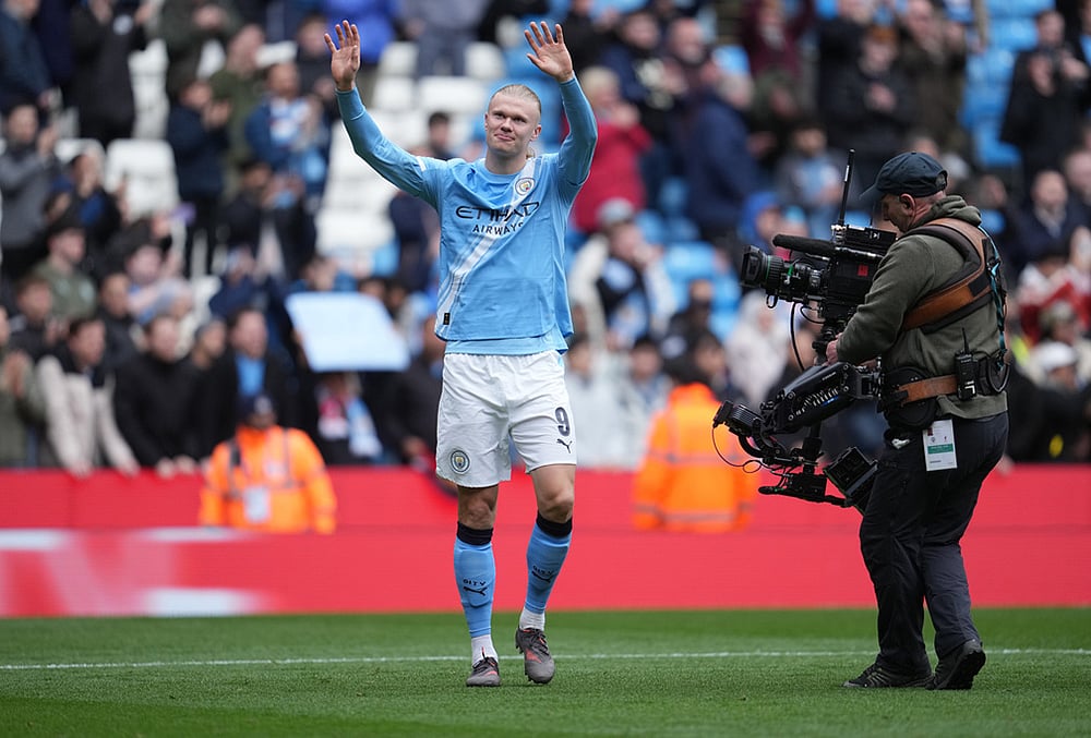 Manchester City's Erling Haaland reacts after the FA Cup quarter-final soccer match between Manchester City and Liverpool in Manchester, England. - | Photo: AP/Jon Super