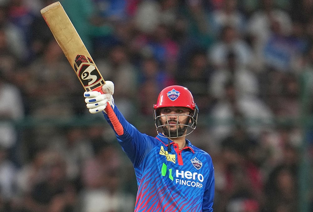 Delhi Capitals' Sameer Rizvi celebrates his fifty runs during the Indian Premier League cricket match between Delhi Capitals and Mumbai Indians in New Delhi. - | Photo: AP/Manish Swarup