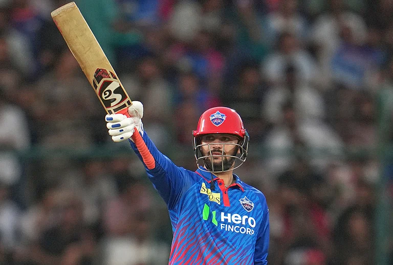 Delhi Capitals' Sameer Rizvi celebrates his fifty runs during the Indian Premier League cricket match between Delhi Capitals and Mumbai Indians in New Delhi. - | Photo: AP/Manish Swarup