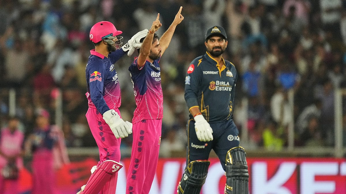 Rajasthan Royals players celebrating a wicket with Ravi Bishnoi against Gujarat Titans in IPL 2026 at Narendra Modi Stadium in Ahmedabad.  - AP Photo