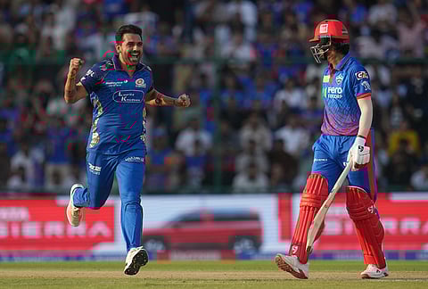 Mumbai Indians' Deepak Chahar celebrates the wicket of Delhi Capitals' KL Rahul during the Indian Premier League cricket match between Delhi Capitals and Mumbai Indians in New Delhi.