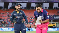 IPL/X : Rashid Khan and Riyan Parag at the toss of GT vs RR IPL 2026 match at the Narendra Modi Stadium in Ahmedabad. 