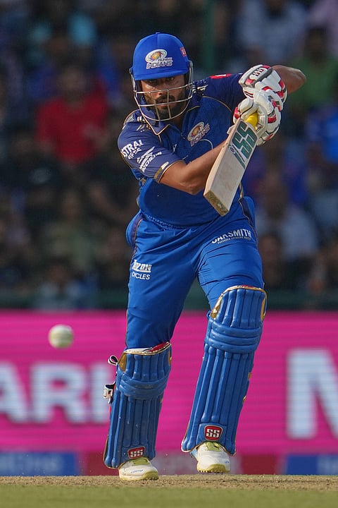 Mumbai Indians' Naman Dhir plays a shot during the Indian Premier League cricket match between Delhi Capitals and Mumbai Indians in New Delhi.