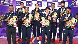 SAI Media : The Karnataka wrestling contingent poses with its medals at Khelo India Tribal Games 2026.