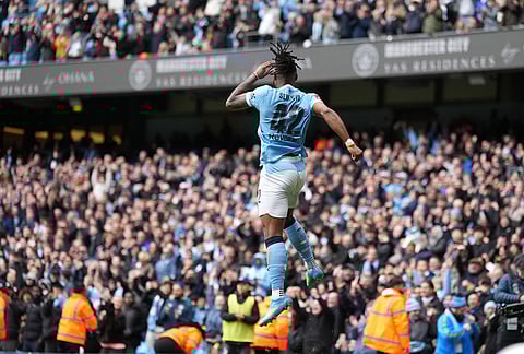 Manchester City's Antoine Semenyo celebrates after scoring during the FA Cup quarter-final soccer match between Manchester City and Liverpool in Manchester, England.