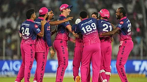 AP Photo : Rajasthan Royals cricketers celebrate a wicket of Gujarat Titans in IPL 2026 clash at the Narendra Modi Stadium in Ahmedabad.