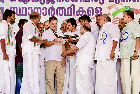 Leader of Opposition in Lok Sabha and Congress leader Rahul Gandhi, centre, with party MP KC Venugopal, and others, during a public meeting ahead of Kerala Assembly elections, in Alappuzha, Kerala. 