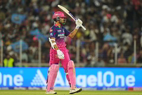 Rajasthan Royals' Yashasvi Jaiswal celebrates his fifty runs during the Indian Premier League cricket match between Gujarat Titans and Rajasthan Royals in Ahmedabad.