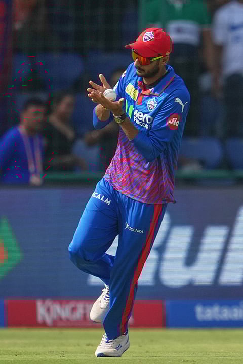 Delhi Capitals' captain Axar Patel takes the catch to dismiss Mumbai Indians' Ryan Rickelton during the Indian Premier League cricket match between Delhi Capitals and Mumbai Indians in New Delhi.