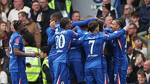 Photo: AP : Chelsea players celebrate after Jorrel Hato scored his side's opening goal during the English FA Cup quarter-final against Port Vale in London.