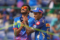 DC Vs MI, IPL 2026: See Best Photos From Indian Premier League Match 8 At Delhi's Arun Jaitley Stadium | Photo: AP/Manish SwarupManish Swarup : Mumbai Indians' stand on captain Suryakumar Yadav, right, playfully holds the hand of Delhi Capitals' captain Axar Patel during the coin toss in the Indian Premier League cricket match between Delhi Capitals and Mumbai Indians in New Delhi.