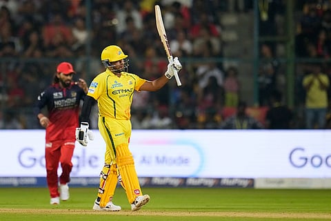 Chennai Super Kings' Sarfaraz Khan celebrates his fifty runs during the Indian Premier League cricket match between Chennai Super Kings and Royal Challengers Bengaluru in Bengaluru, India.