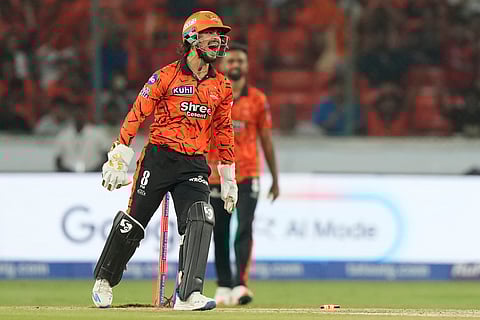 Sunrisers Hyderabad's captain Ishan Kishan celebrates the wicket of Lucknow Super Giants' Nicholas Pooran during the Indian Premier League cricket match between Sunrisers Hyderabad and Lucknow Super Giants in Hyderabad, India.