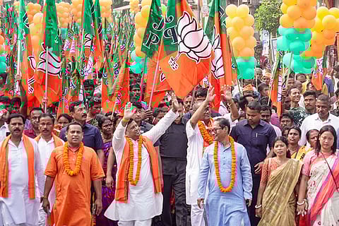 Union Minister of State and BJP leader Sukanta Majumdar campaigns for a party candidate ahead of the West Bengal Assembly elections, in Jalpaiguri district.
