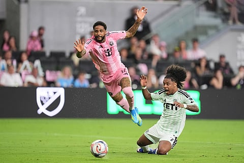 Austin FC forward Jayden Nelson, right, clashes with past Inter Miami defender Micael Dos Santos during the second half of an MLS soccer match in Miami.