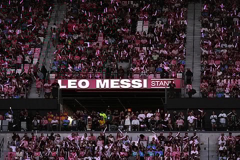 Fans watch from a section of the stands named for Inter Miami forward Lionel Messi, at the start of the first MLS soccer match played in Nu Stadium, Inter Miami's new home stadium, against Austin FC in Miami.