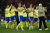| Photo: AP/Dave Shopland : Southampton's team players celebrate after the English FA Cup quaterfinal soccer match between Southampton and Arsenal in Southampton, England.