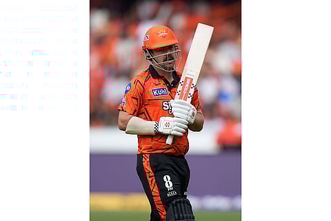 Sunrisers Hyderabad's Travis Head leaves the ground after losing his wicket during the Indian Premier League cricket match between Sunrisers Hyderabad and Lucknow Super Giants in Hyderabad, India.