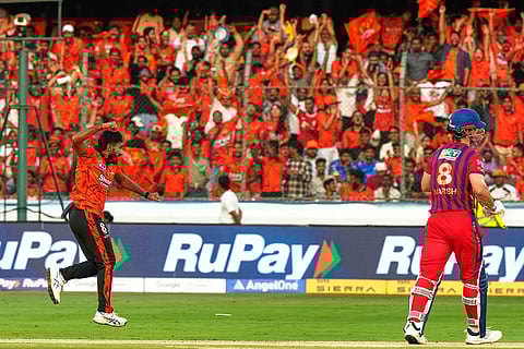 Sunrisers Hyderabad's Eshan Malinga celebrates the wicket of Lucknow Super Giants' Mitchell Marsh during the Indian Premier League cricket match between Sunrisers Hyderabad and Lucknow Super Giants in Hyderabad, India.