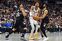 Denver Nuggets Vs San Antonio Spurs, NBA 2026: Nuggets Edge Spurs in Thriller to Climb West Standings - In Pics | Photo: AP/David Zalubowski : San Antonio Spurs center Victor Wembanyama is fouled by Denver Nuggets guard Jamal Murray, right, while driving past forward Aaron Gordon in the first half of an NBA basketball game in Denver.