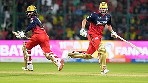 AP : Royal Challengers Bengaluru's captain Rajat Patidar, left, and batting partner Tim David run between the wickets during their Indian Premier League match against Chennai Super Kings in Bengaluru.