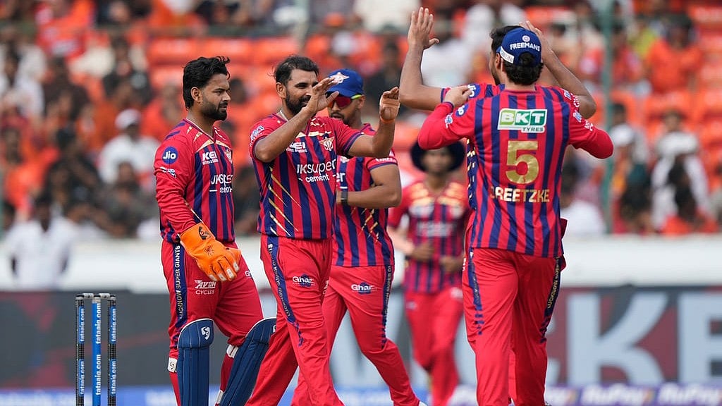 AP : Lucknow Super Giants' Mohammed Shami, centre, celebrates with teammates the wicket of Sunrisers Hyderabad's Travis Head during their Indian Premier League 2026 match in Hyderabad.