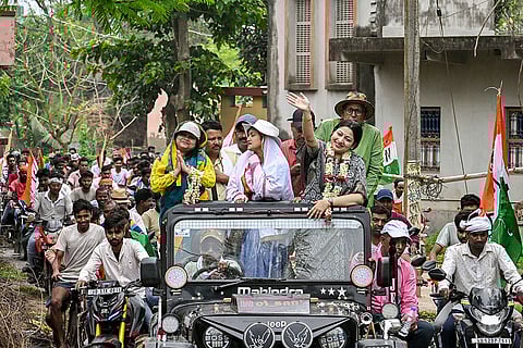 TMC candidate for Kaliganj constituency, Alifa Ahmed, waves to the gathering during an election campaign ahead of the West Bengal Assembly Election, in Nadia district.