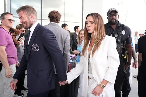 Inter Miami co-owner David Beckham, left, and wife Victoria Beckham walk inside Nu Stadium ahead of an MLS soccer match between Inter Miami and Austin FC in Miami.