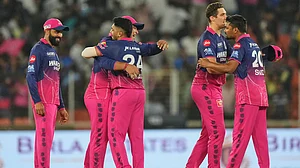 | Photo: AP/Ajit Solanki : Rajasthan Royals players celebrate after winning the Indian Premier League cricket match against Gujarat Titans in Ahmedabad.