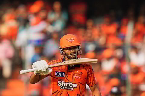 Sunrisers Hyderabad's Nitish Kumar Reddy celebrates his fifty runs during the Indian Premier League cricket match between Sunrisers Hyderabad and Lucknow Super Giants in Hyderabad, India.