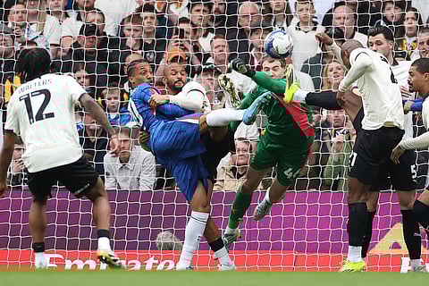 Chelsea's Joao Pedro, centre left, makes an attempt to score during the English FA Cup quarterfinal soccer match between Chelsea and Port Vale in London, England.