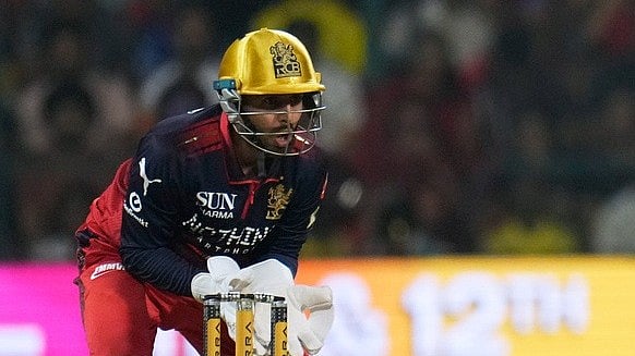 Jitesh Sharma in action against Chennai Super Kings at the M Chinnaswamy Stadium in Bengaluru.  - AP Photo