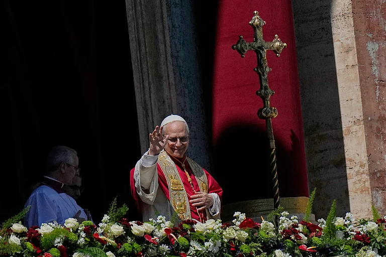 Pope Leo XIV addresses the faithful after delivering the Urbi et Orbi blessing - Latin for "to the city of Rome and to the world" - from the central loggia of St. Peter's Basilica at the end of Easter Mass he presided over in St. Peter's Square at the Vatican, Sunday, April 5, 2026. - AP/Alessandra Tarantino