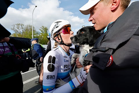 Netherland's Demi Vollering celebrates after winning the Tour of Flanders cycling race, in Oudenaarde, Belgium.