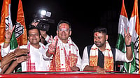 Photo: PTI : Assam Congress chief and candidate from Jorhat constituency Gaurav Gogoi, centre, and Assam Jatiya Parishad (AJP) Lurinjyoti Gogoi, right, during a roadshow in support of Congress candidate from New Guwahati constituency Santanu Bora ahead of the state Assembly elections, in Guwahati, Friday, April 3, 2026.