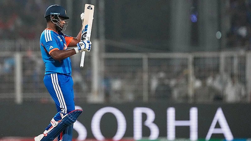 Sanju Samson applauds a shot by Tilak Varma during the T20 World Cup match between India and West Indies in Kolkata.  - File/AP