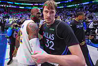 Dallas Mavericks Vs Los Angeles Lakers, NBA 2026: Flagg’s Historic 45-Point Night Snaps Mavs' Home Slump | Photo: AP/LM Otero : Dallas Mavericks forward Cooper Flagg (32) and Los Angeles Lakers forward LeBron James (23) hug at the end of their NBA basketball game in Dallas.