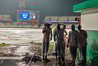 KKR Vs PBKS, IPL 2026: See Best Photos From Indian Premier League Match 12 At Kolkata's Eden Gardens | Photo: AP/Bikas Das : Ground staff stand on rain covers as it rains during the Indian Premier League cricket match between Kolkata Knight Riders and Punjab Kings in Kolkata.