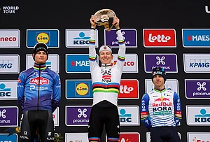 | Photo: AP/Geert Vanden Wijngaert : Slovenia's Tadej Pogacar celebrates after winning the Tour of Flanders cycling race, with Netherland's Mathieu Van Der Poel, left, finishing second and Belgium's Remco Evenpoel third in Oudenaarde, Belgium.