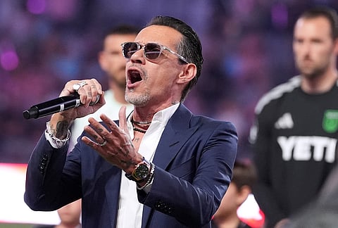 Marc Anthony performs the national anthem before an MLS soccer match between Inter Miami and Austin FC, in Miami. 