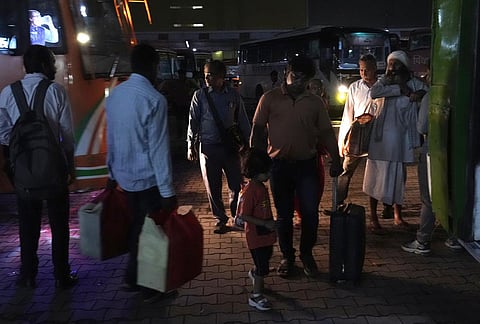 Migrant daily wage workers leaving for their hometown from Anand Vihar bus stand