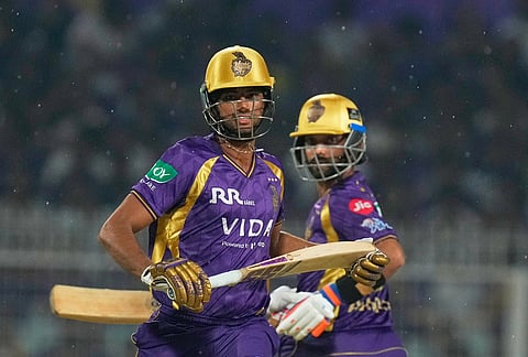 Kolkata Knight Riders' captain Ajinkya Rahane, right, and Akash Deep run between the wickets to score during the Indian Premier League cricket match between Kolkata Knight Riders and Punjab Kings in Kolkata.