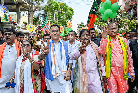 BJP candidate from Santipur Assembly constituency Swapan Kumar Das enroute to submit nomination papers for the West Bengal Assembly elections, in Ranaghat, West Bengal.