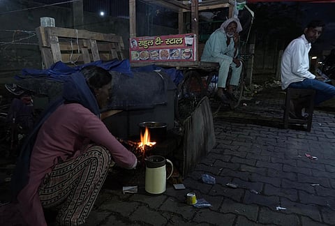 Rita, a tea seller who used to make tea on a stove, currently uses an earthen stove due to the ongoing LPG cylinder shortage. She also plans to move back to her village if things don’t change in the coming week or two. Ghazipur, New Delhi