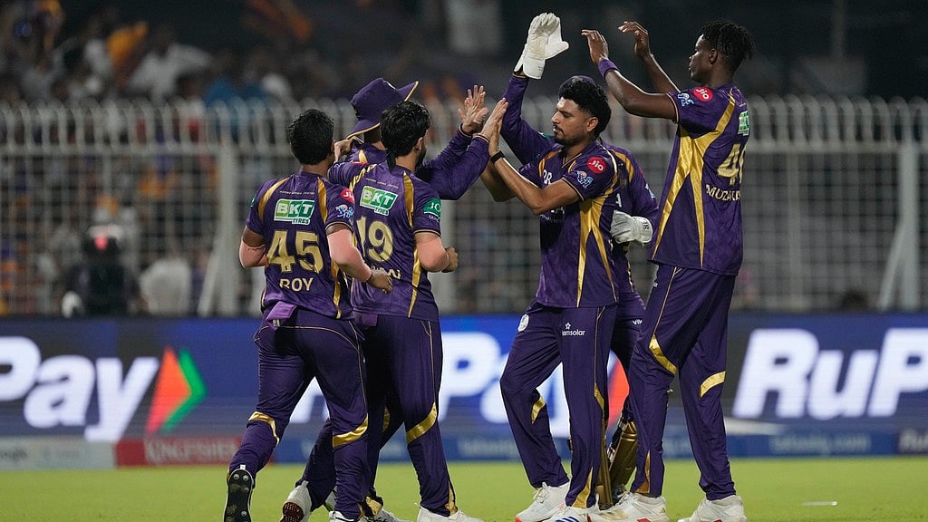 Kolkata Knight Riders' Blessing Muzarabani, right, celebrates the wicket of Sunrisers Hyderabad's Abhishek Sharma during their Indian Premier League match in Kolkata. - AP