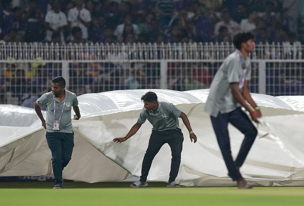 KKR Vs PBKS Indian premier league 2026 match 12 photos-Ground staff pull in rain covers