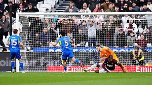 (John Walton/PA via AP) : West Ham United's Axel Disasi, center right, scores their side's second goal during their English FA Cup, quarter-final soccer match against Leeds United in London, Sunday, April 5, 2026.