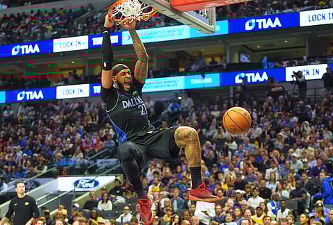Dallas Mavericks forward Daniel Gafford dunks during the second half of an NBA basketball game against the Dallas Mavericks in Dallas.