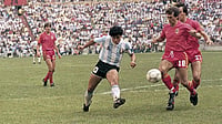 Diego Maradona’s Legendary 1989 Warm-Up Routine Invoked In ESPN Netherlands Advertisement – Watch | Photo: Wikimedia Commons : Diego Maradona dodging Daniel Veyt and Stéphane Demol on June 25, 1986.