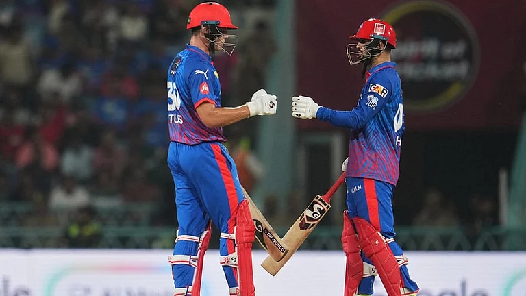 Delhi Capitals' Sameer Rizvi, right, and batting partner Tristan Stubbs encourage each other during the Indian Premier League cricket match between Lucknow Super Giants and Delhi Capitals in Lucknow, India. - | Photo: AP/Manish Swarup